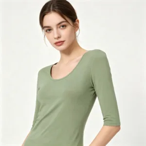a lady in a half-sleeved jade Tee