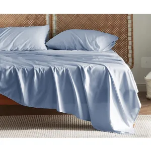bed with baby blue bedding