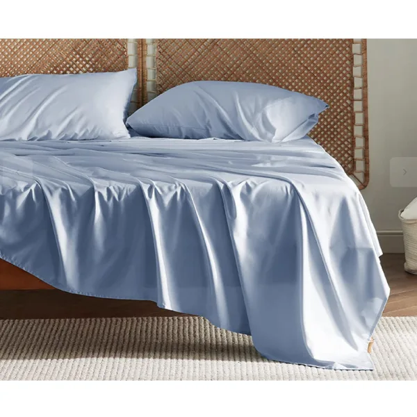 bed with baby blue bedding