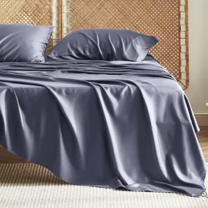 bed with dark gray bedding